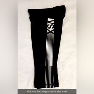 Victoria’s Secret sport Black capris with White Stripes